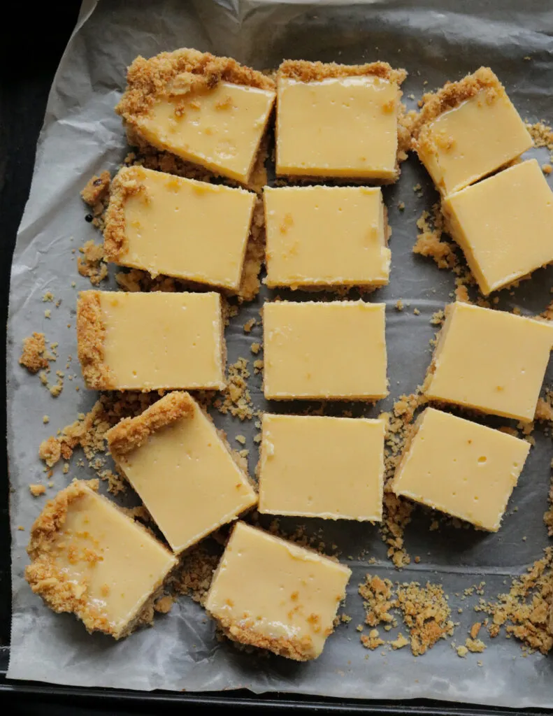 Condensed milk lemon bars with a crust.