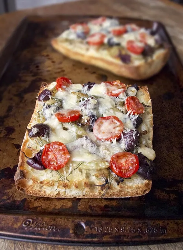 Fennel, olives and parmesan ciabatta pizza